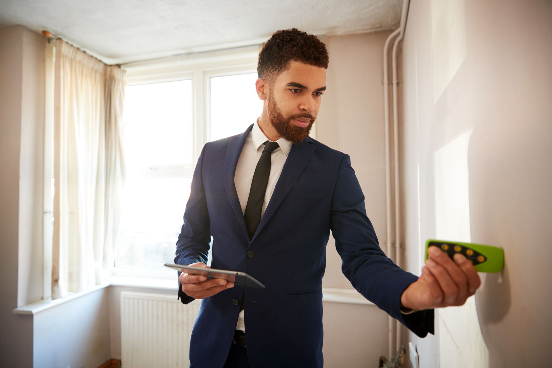 Takstmann måler opp bolig